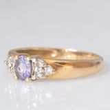 Vintage 9K yellow gold band ring with tanzanite (0.40ct approx.) and diamonds (0.12ctw approx.), year 2004