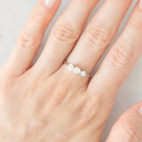 Vintage-Trilogie aus 14 Karat Weißgold mit Diamanten im Brillantschliff (ca. 0.26 Karat), 90er Jahre
