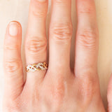 Anello vintage intrecciato in oro giallo e bianco 9K con diamanti (0.04ctw ca.), anni ‘70