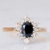 Anello a margherita vintage in oro giallo 9K con zaffiro (1ct ca.) e diamanti di taglio brillante (0.33ctw ca.), anno 1987