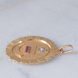 Ciondolo vintage “Plus qu’hier moins que demain” in oro giallo 18K con diamante e rubini