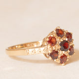 Anello a fiore vintage in oro giallo 9K con granati (0.60ctw ca.), anno 1966