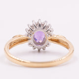 Anello a margherita vintage in oro giallo 9K con ametista (0.40ct ca.) e diamanti (0.16ctw ca.), anni ‘80/‘90