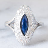 Anello a margherita navette in oro bianco 14K con zaffiro (1ct ca.) e diamanti (0.72ctw ca.), anni ‘70/‘80