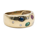Bague vintage en or jaune 14 carats avec saphir, rubis, émeraude et diamants. Années 70