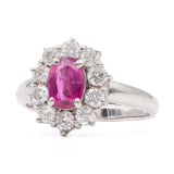 ANELLO VINTAGE A MARGHERITA IN PLATINO 850 CON RUBINO NATURALE (1CT) E DIAMANTI (0.85CT)