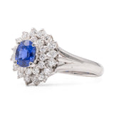ANELLO VINTAGE A BALLERINA IN PLATINO CON ZAFFIRO (0.56CT) E DIAMANTI (0.46CTW)
