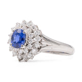 ANELLO VINTAGE A BALLERINA IN PLATINO CON ZAFFIRO (0.56CT) E DIAMANTI (0.46CTW)