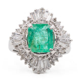 ANELLO A BALLERINA IN PLATINO 900 CON SMERALDO CENTRALE (1.80 CT) E DIAMANTI (1.05CT)