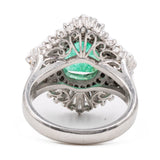 ANELLO A BALLERINA IN PLATINO 900 CON SMERALDO CENTRALE (1.80 CT) E DIAMANTI (1.05CT)