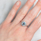 Anello a margherita vintage in platino con acquamarina (0.93ct) e diamanti (0.29ctw), anni ‘80