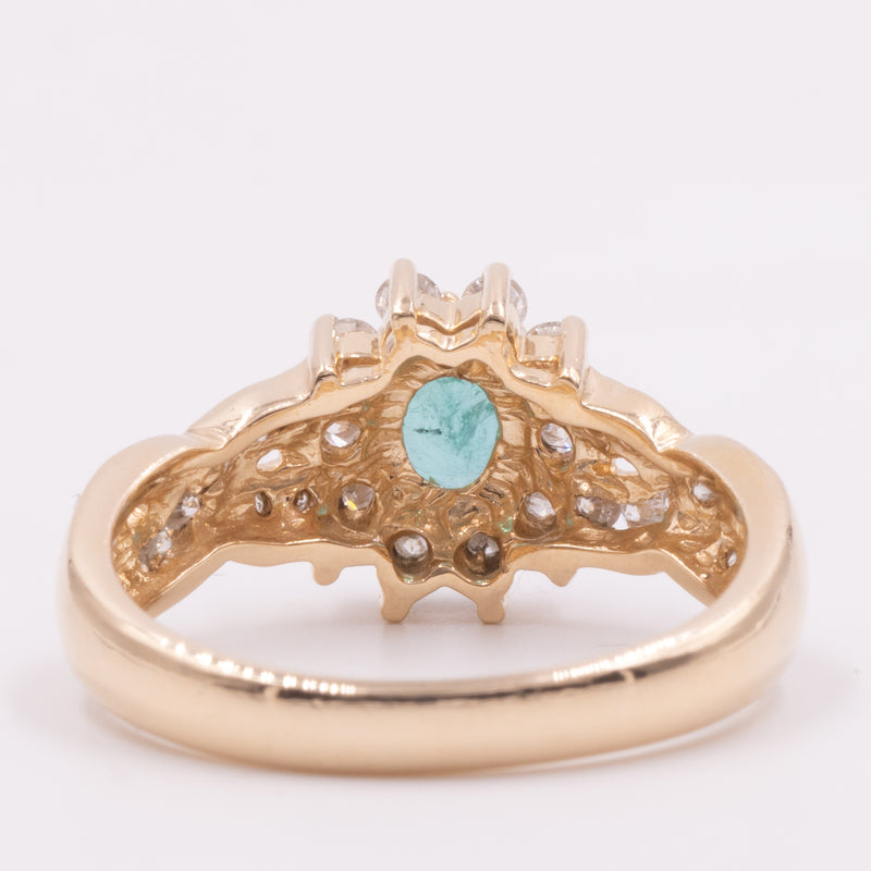 Anello a margherita vintage in oro giallo 14K con smeraldo (0.40ct ca.) e diamanti di taglio brillante (0.60ctw ca.), anni ‘70/‘80