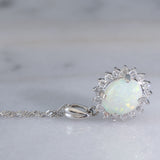 Collana vintage in platino con ciondolo con opale (1.78ct) e diamanti (0.56ctw)