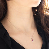Collana vintage in platino con ciondolo con rubino (0.21ct) e diamanti di taglio brillante (0.24ctw)