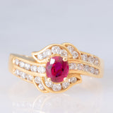 Anello a margherita vintage in oro giallo 18K con rubino (0.51ct) e diamanti (0.41ctw), anni ‘80/‘90