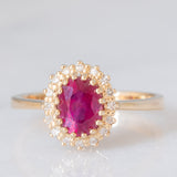 Anello a margherita vintage in oro giallo 14K con rubino (1.50ct ca.) e diamanti (0.16ctw ca.), anni ‘70/‘80
