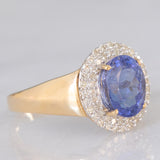 Anello a margherita vintage in oro giallo e bianco 14K con tanzanite (2.10ct ca.) e diamanti (0.30ctw ca.), anni ‘80