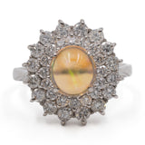 Anello vintage in platino 900 con opale di 1,97ct e diamanti per un totale di 1,08ct