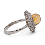 Anello vintage in platino 900 con opale di 1,97ct e diamanti per un totale di 1,08ct