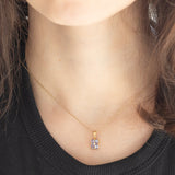 Coppia di ciondoli vintage in oro giallo 9K con tanzaniti e diamante e in oro giallo 8K con tanzaniti e peridoti