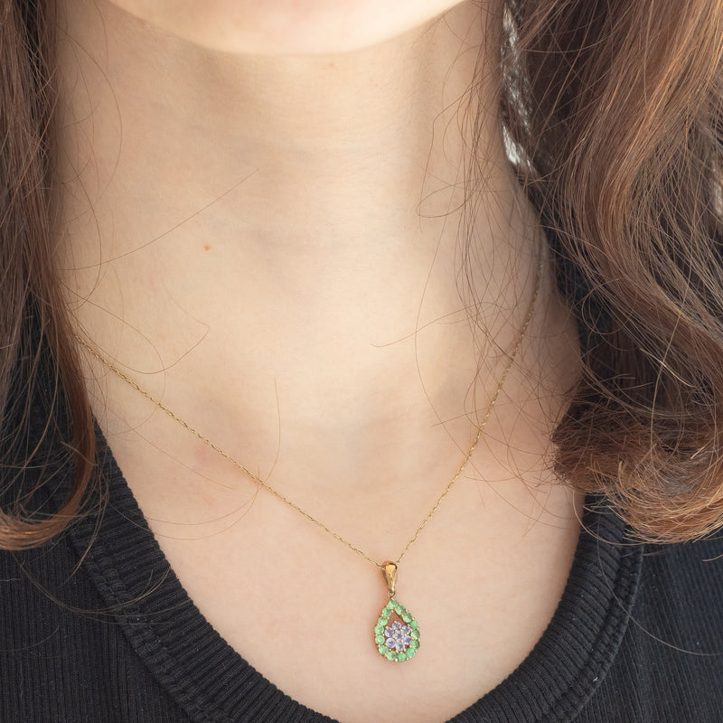 Coppia di ciondoli vintage in oro giallo 9K con tanzaniti e diamante e in oro giallo 8K con tanzaniti e peridoti