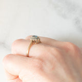 Anello a margherita in oro giallo 9K con topazio azzurro (0.35ct ca.) e diamanti (0.12ctw ca.), anni ‘90