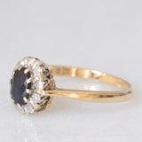 Anello a margherita vintage in oro giallo 9K con zaffiro (0.75ct ca.) e diamanti (0.10ctw ca.), anno 1981