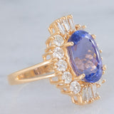 Anello ballerina vintage in oro giallo 14K con tanzanite (5.60ct ca.) e diamanti di taglio brillante e tapered (1.30ctw ca.), anni ‘70/‘80