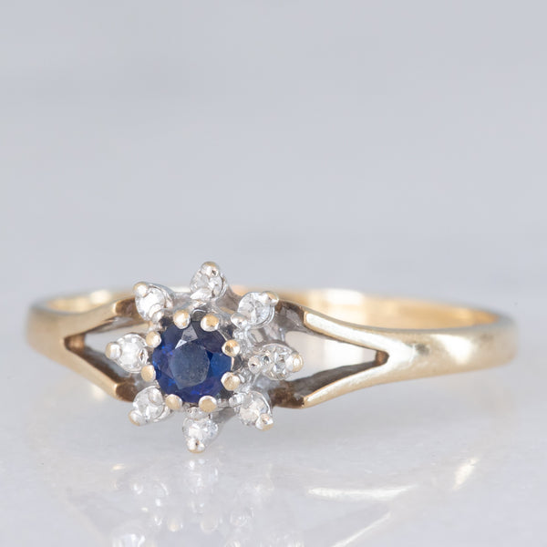 Anello a margherita vintage in oro giallo 9K con zaffiro (0.10ct ca.) e diamanti (0.08ctw ca.), anno 1987