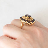 Anello vintage in oro giallo 18K con granati (3.50ctw ca.), anni ‘50/‘60