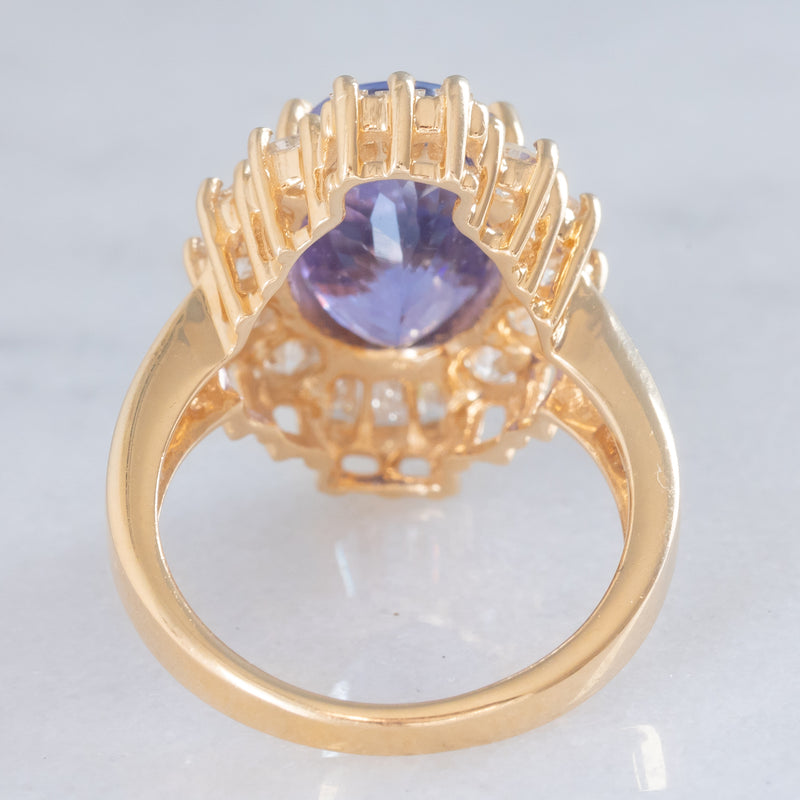 Anello ballerina vintage in oro giallo 14K con tanzanite (5.60ct ca.) e diamanti di taglio brillante e tapered (1.30ctw ca.), anni ‘70/‘80
