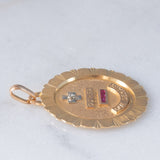 Ciondolo vintage “Plus qu’hier moins que demain” in oro giallo 18K con diamante e rubini