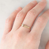 Solitario vintage in oro giallo 9K con diamante di taglio brillante (0.10ct ca.), anno 1989