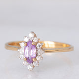 Anello a margherita in oro giallo 9K con zaffiro viola sintetico (0.25ct) e zirconi bianchi