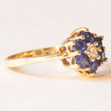 Vintage 14K yellow gold daisy ring with synthetic sapphires (approx. 0.60ctw) and brilliant cut diamond (approx. 0.10ct), 80s/90s