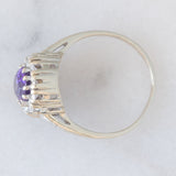 Anello a margherita vintage in oro bianco 14K con ametista (0.70ct ca.) e diamanti (0.50ctw ca.), anni ‘70