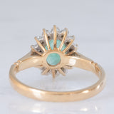 Anello a margherita vintage in oro giallo e bianco 9K con smeraldo (0.70ct ca.) e diamanti (0.20ctw ca.), anni ‘80