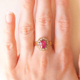 Antique 18K yellow gold daisy ring with synthetic ruby (1.60ct approx.) and rose cut diamonds (0.24ctw approx.), early 900s