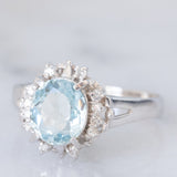 Anello a margherita vintage in platino con acquamarina (1.09ct) e diamanti (0.10ctw), anni ‘80/‘90