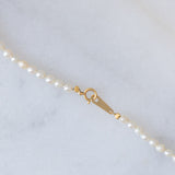 Collana vintage in oro giallo 18K con perle bianche, anni ‘70