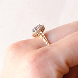 Vintage-Ring aus 9-karätigem Gelb- und Weißgold mit Saphir (ca. 0.60 ct) und Diamanten, 1987
