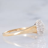 Anello a fiore vintage in oro giallo e bianco 14K con diamanti di taglio brillante (0.55ctw ca.), anni ‘80