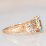 Anello vintage in oro giallo 9K con topazi azzurri (0.80ctw ca.) e diamanti, anni ‘80/‘90