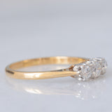 Trilogy antico in oro giallo e bianco 18K con diamanti di taglio brillante (0.40ctw ca.), anni ‘20/‘30