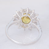 Anello a fiore vintage in platino con topazio verde (2.76ct) e diamanti (1.11ctw), anni ‘2000