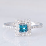 Anello a margherita vintage in oro bianco 18K con diamante blu (0.54ct) e diamanti bianchi (0.40ctw)