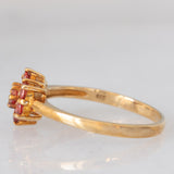 Anello a fiore in oro giallo 9K con zaffiri rossi (0.55ctw)