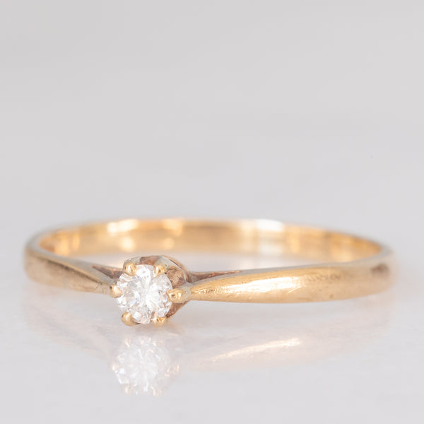 Solitario vintage in oro giallo 9K con diamante di taglio brillante (0.10ct ca.), anno 1982