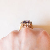 Anello a margherita vintage in oro giallo 10K con ametista (4ct ca.) e diamanti di taglio brillante (0.60ctw ca.), anni ‘60/‘70