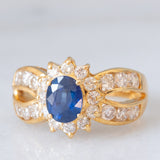 Un’alba sul mare - Anello vintage a fascia e a margherita in oro giallo 18K con zaffiro e diamanti